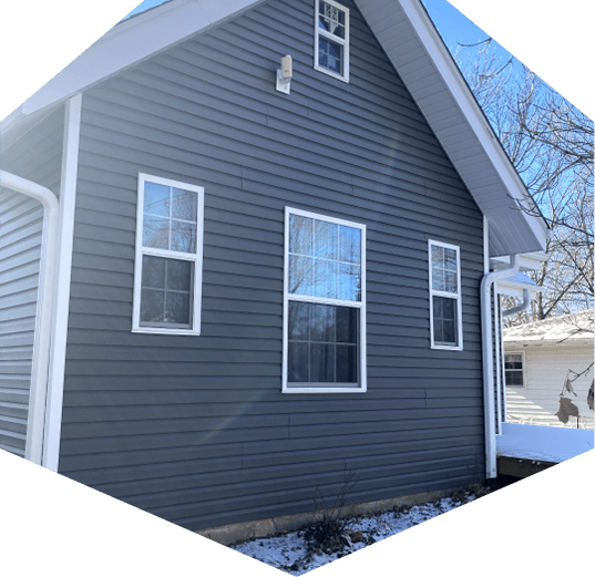 Gutters and siding installed by the professionals at Resolve Roofing