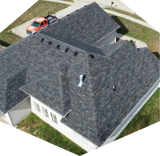 An aerial view of a finished residential roof repair