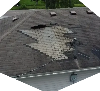 A home in need of a residential roof repair