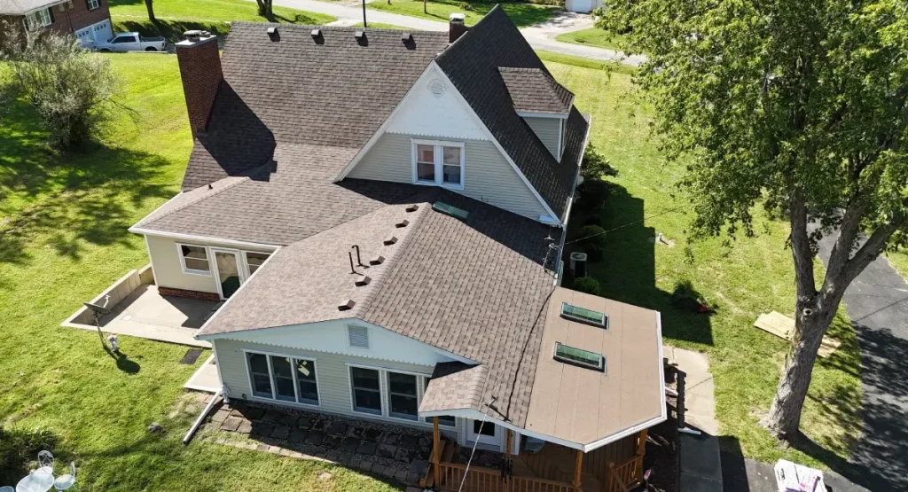 Roof Replacement in Columbia, MO, as seen in a blog answering, "What happens if it rains during a roof replacement?"