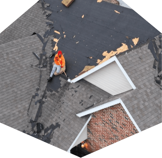 Resolve Roofing MO Residential Roof Repair, man fixing black roof
