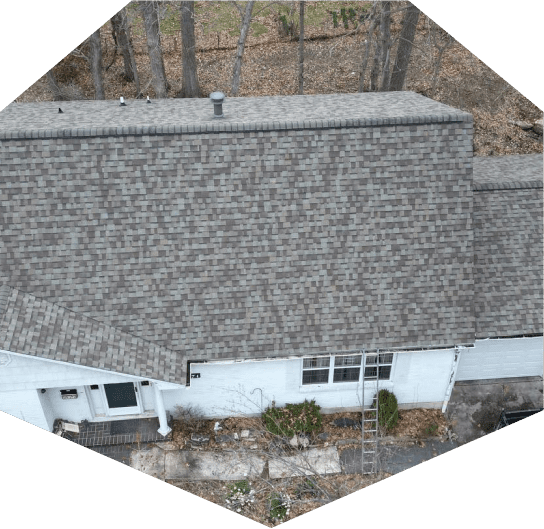 Aerial view of a shingled roof.