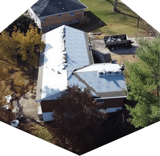 Aerial view of roofing project underway.