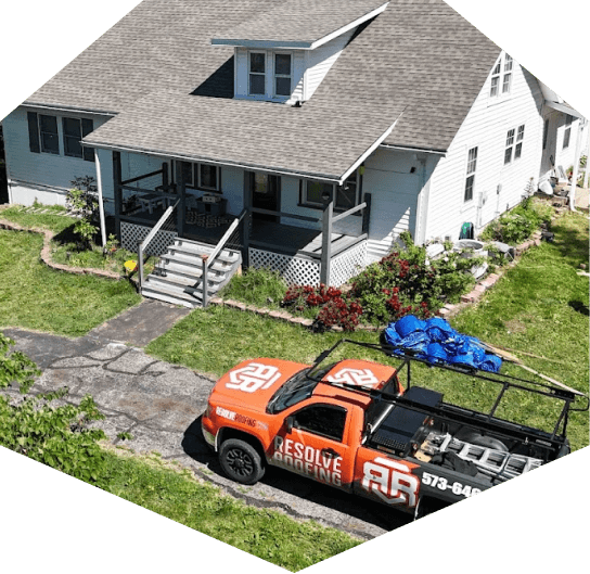 House with truck and landscaping tools